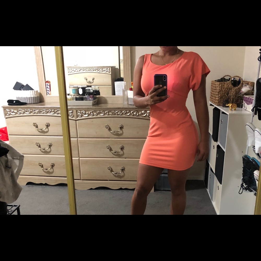 BEBE small coral colored bodycon mini dress